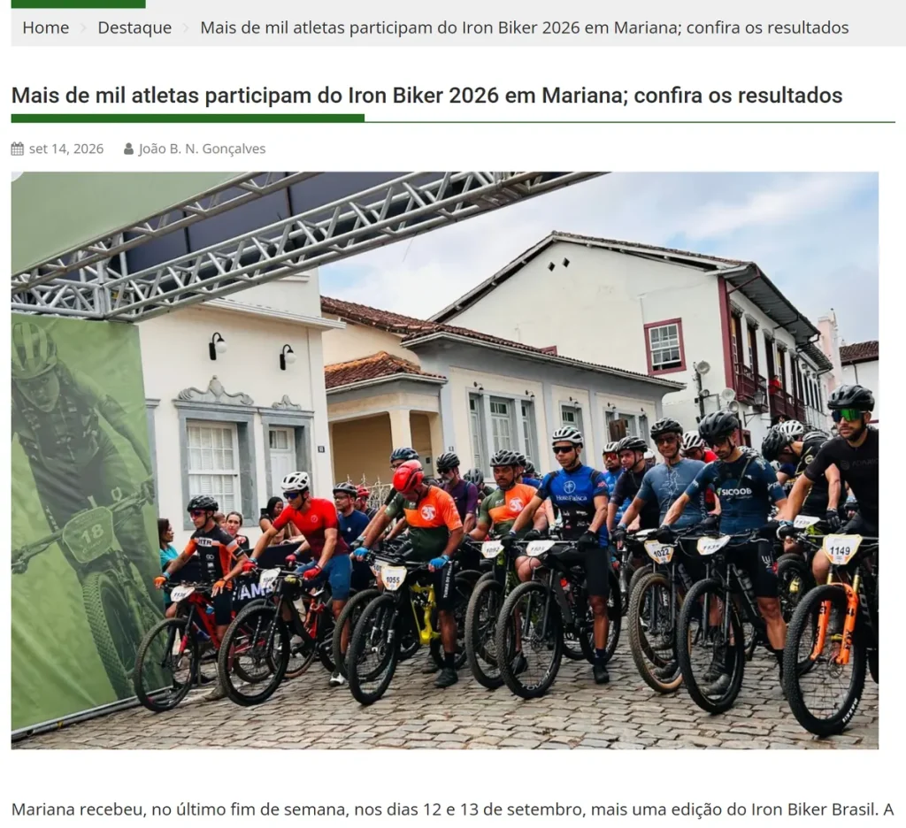 Notícia: mais de mil atletas participam do Iron Biker 2026 em Mariana, com foto da largada